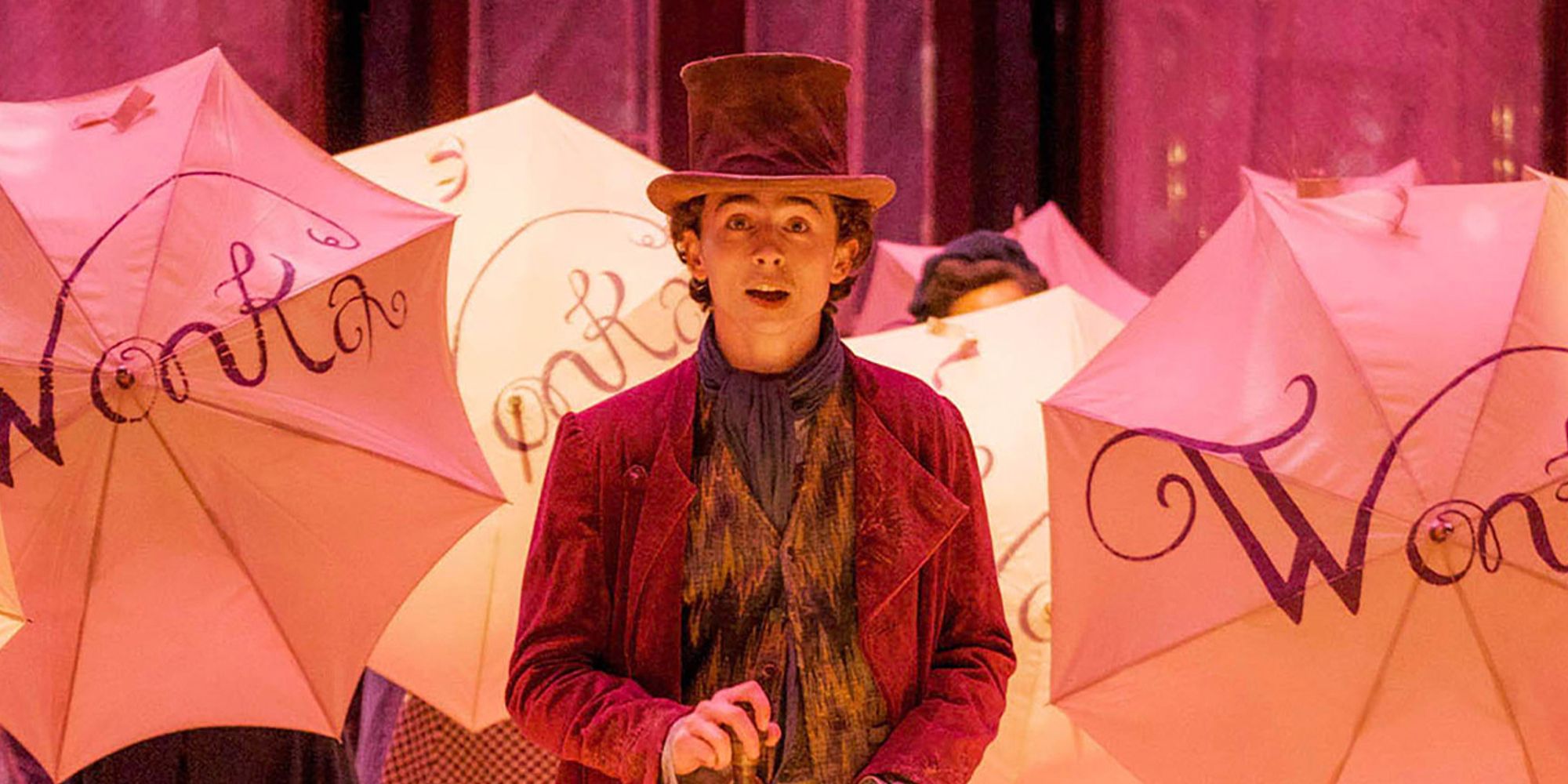 Enchanting New Images of Willy Wonka Movie: Hugh Grant Transforms into a Playful Oompa-Loompa, Timothée Chalamet Charms as the Candy Maker